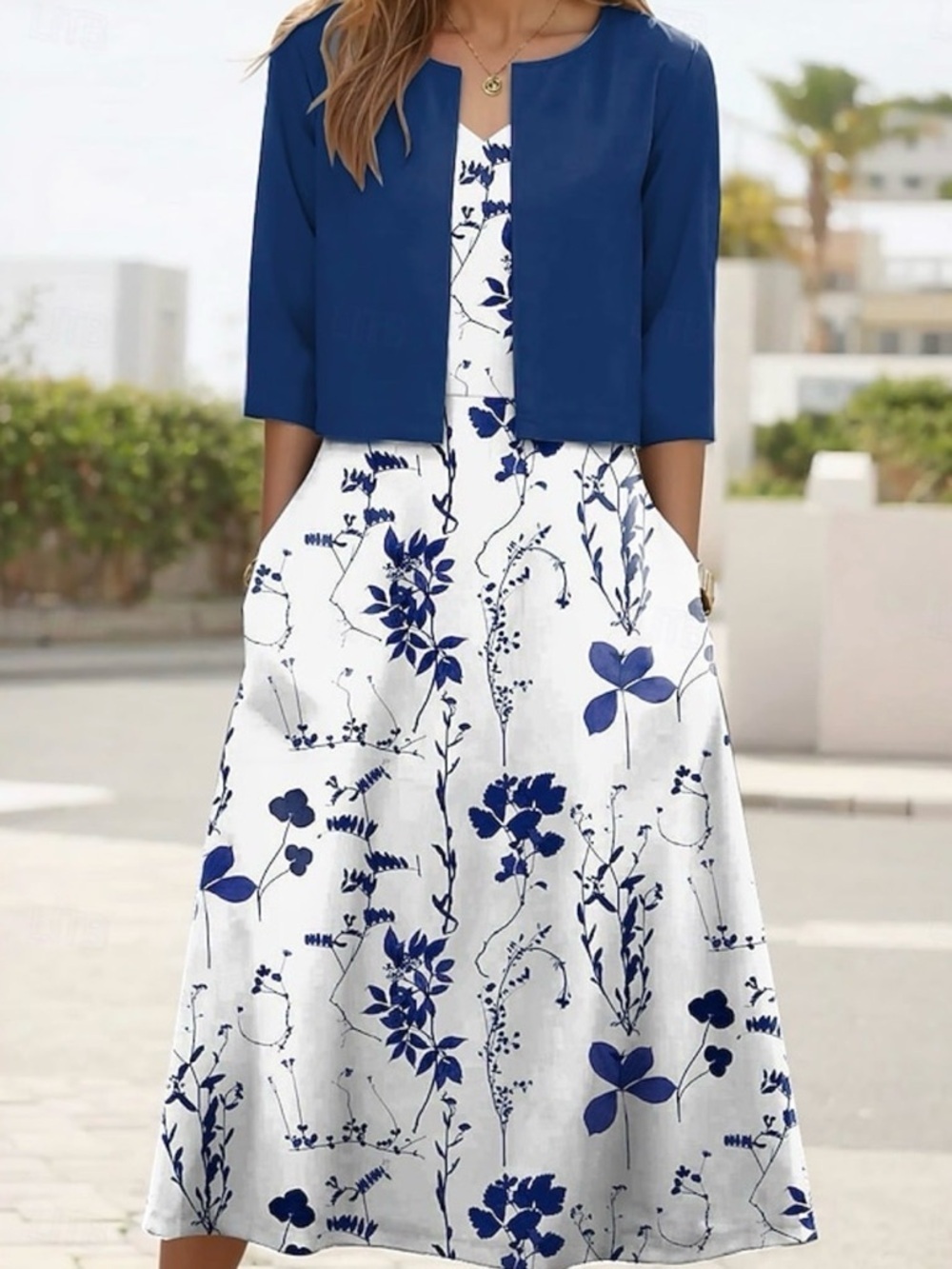 White Maxi Dress with Navy Floral Print and Navy Cropped Jacket